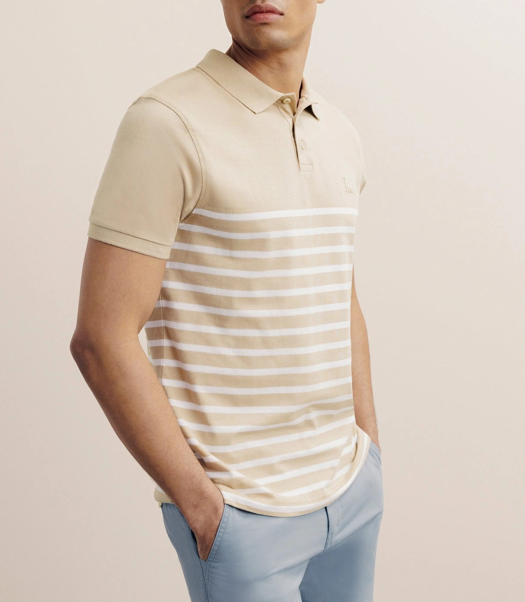 Polo boutonné marinière beige