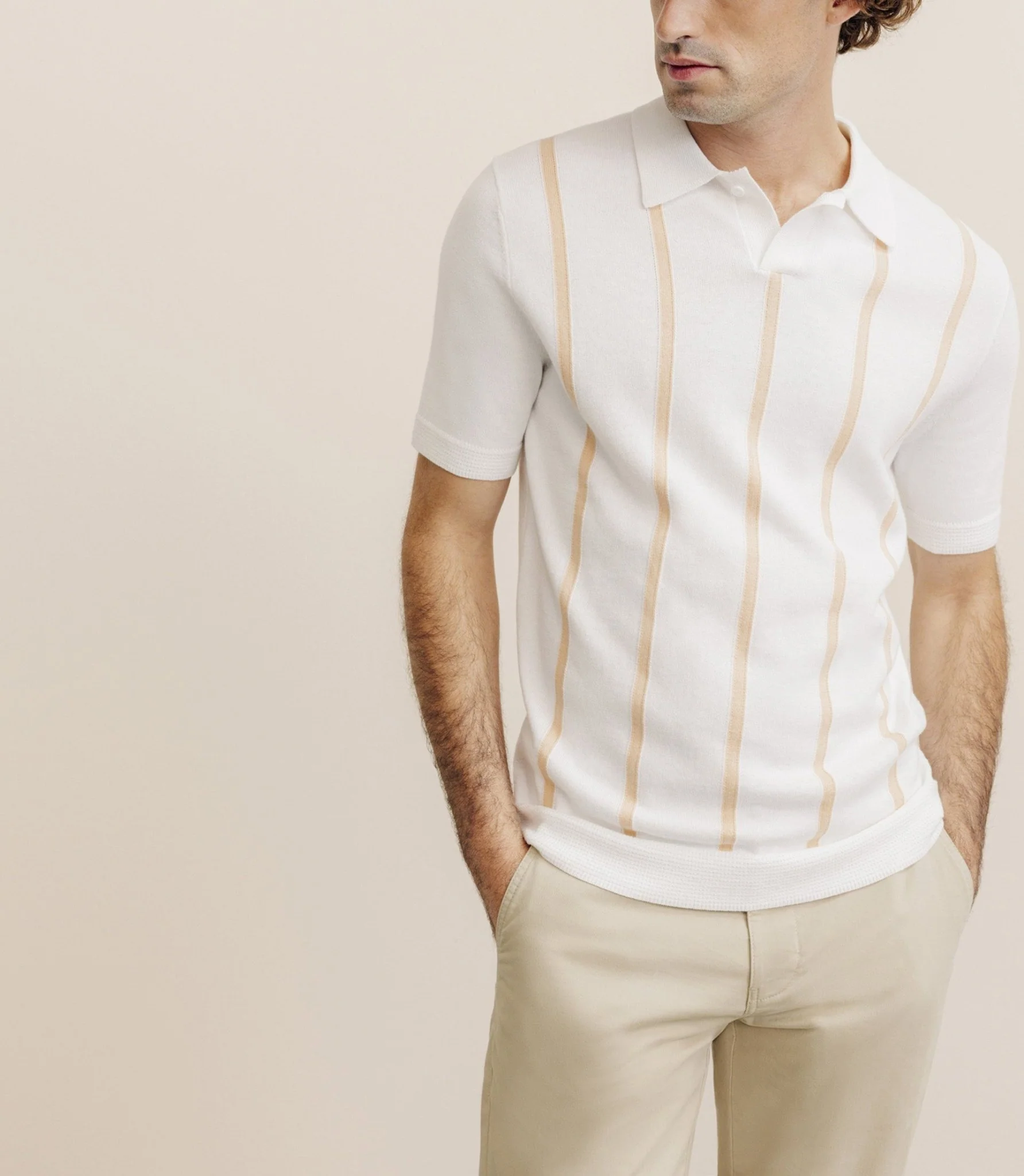 Polo en maille à rayures pêche